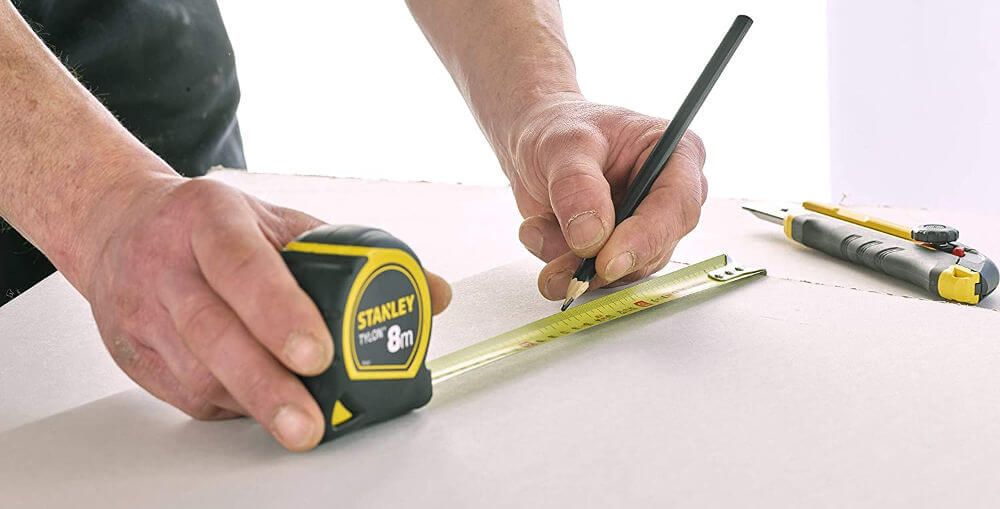 herramienta de carpintería para medir: cinta métrica o flexómetro